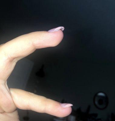 Super crooked nail (my pinky was glued to reach for the sky apparently)