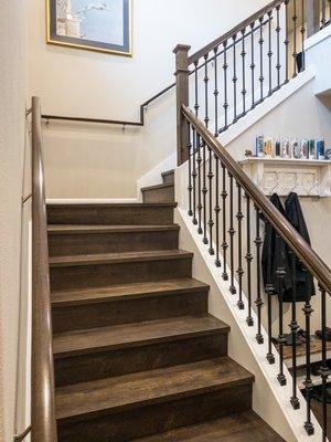 New Laminate flooring remodel with custom fabricate stair nose