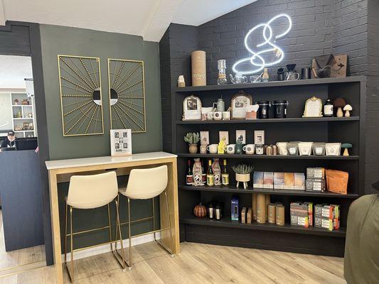 A coffee sipping bar and a wellness wall.