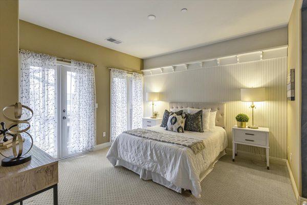 This is an example of XO Staging in a master bedroom where Shelly the designer had to work with existing paint colors.