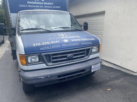 Their truck parked behind resident garage - note car "legally" parked to the side of curb behind it- no vehicles could get through