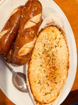 Hot crab dip so good just needs more soft pretzels sticks.