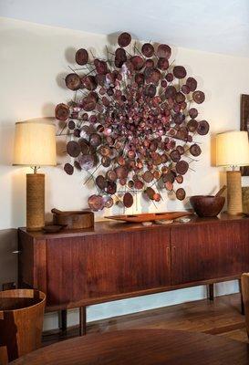 Hans Wegner Teak Credenza with Frank Gehry Lamps and a Monumental Curtis Jere Style Brutalist Starburst Wall Sculpture.