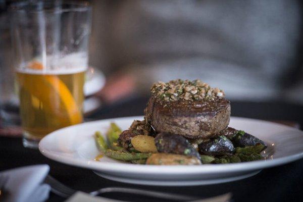 Our 9oz Misty Isle beef tenderloin comes with roasted fingerling potatoes, Argentine chimchurri and asparagus.