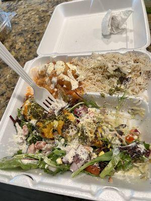 Grilled chicken, Greek salad, rice and potatoes.