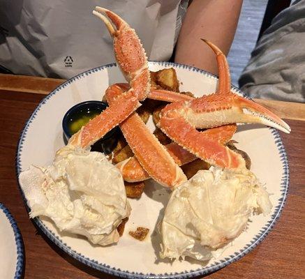 Bairdi Alaskan Crab steamed (1lb) over crispy fried potato chunks.