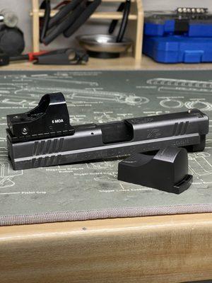 SpringField XD40 we installed a rear sight optic plate a great option if you aren't set on milling your slide for a red dot.