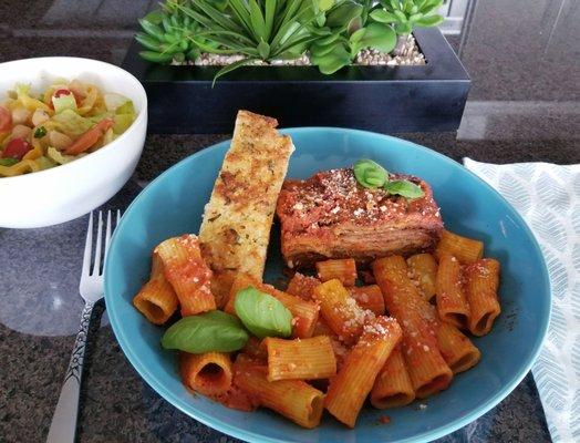 Eggplant Parmigiana- thin slices fried, layered and baked. Delish. Rigatoni & side salad.