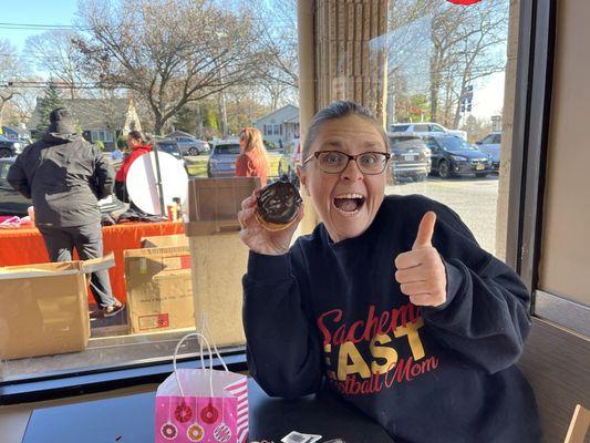 Awesome Sachem East mom with her delicious free donut.