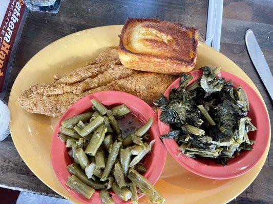 Fried catfish, cornbread, green beans, and greens.