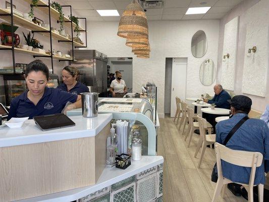 Fresh new serving layout and dining area. Same as before, but improved equipment placement and very cute decor!