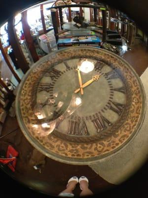 Beautiful coffee table with a clock for $89 (located upstairs next to the books)