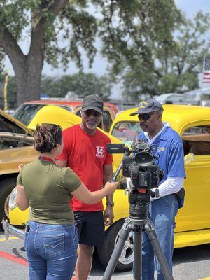 George the organizer of the car show and blood drive being interviewed with Rotary member Scottie by Ksat news