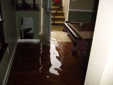 flooded basement from heavy rain.