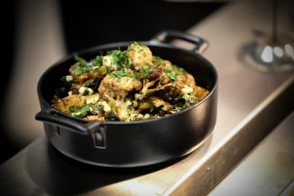 Crispy Fried Cauliflower & Brussel Sprouts | Toasted Pine Nuts, Golden Raisins, Balsamic.