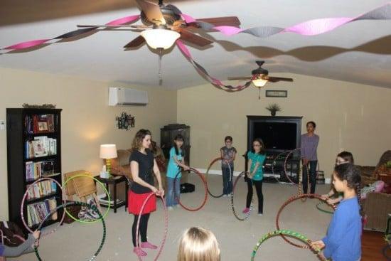 I bring deluxe hula hoops for all of your guests to borrow during the event, so that they can play games and learn tricks.