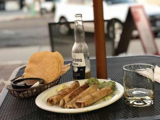 happy hour with the best taquitos in town.