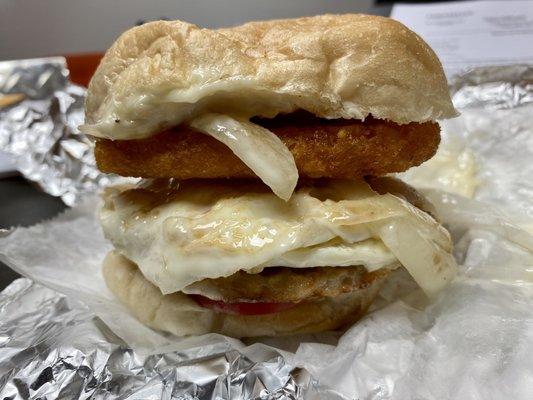 Sausage egg and cheese. Fried onions, tomato and hash brown.