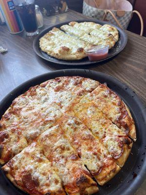 Pepperoni pizza and garlic cheese bread