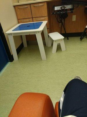 Little kids table for little ones waiting for patient during treatment