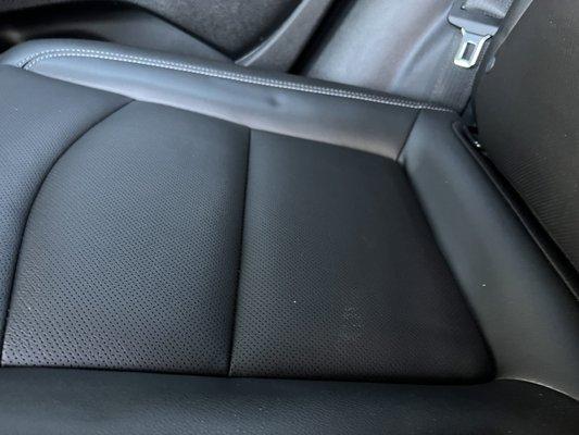 No vacuum or wipe down on the leather seats.