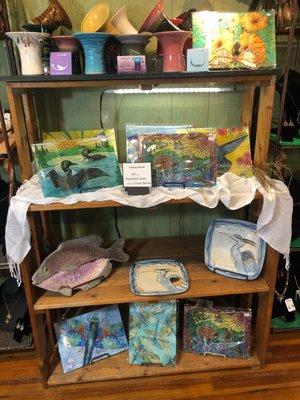 Green Hill Gallery - your happy place gift store!  Glass cutting boards, hand sculpted pottery art and earring holders- a gift for everyone.