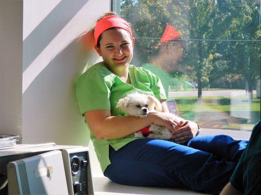 Draper Animal Technicians love to cuddle our patients in the warm sun.