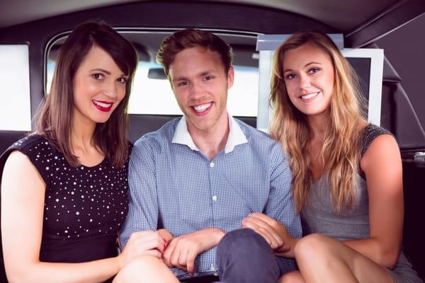 A group of friends lounges in one of our top-of-the-line limos!