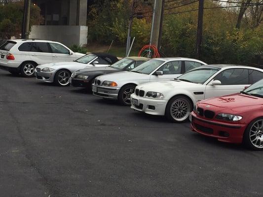 Variety of BMW vehicles lined up outside AKTIV Automotive.