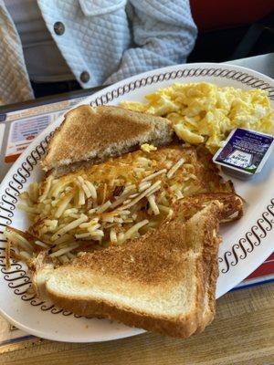 All American breakfast with hasbrowns and scrambled eggs