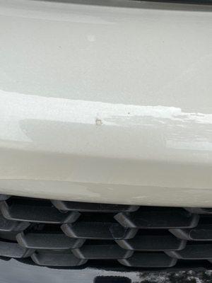 Chip in bumper that was supposed to be repaired.