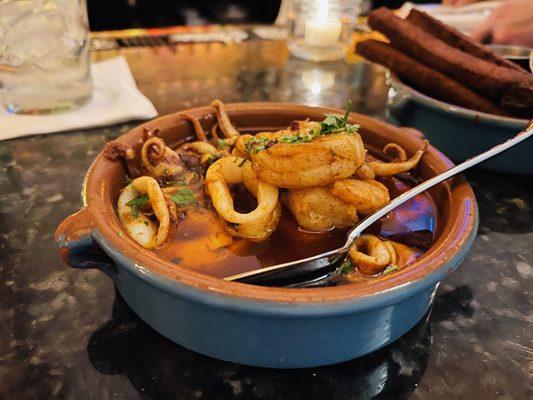 Shrimp, squid, olive oil, garlic, smoked paprika + parsley