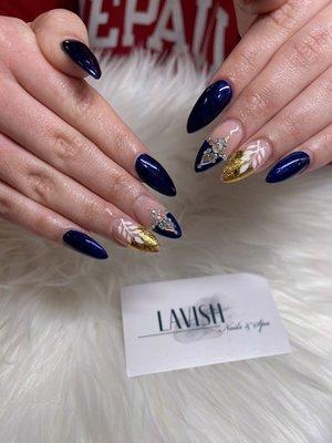 Midnight blue gold foil nails design