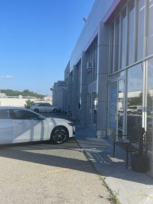 Side entrance and service garage.