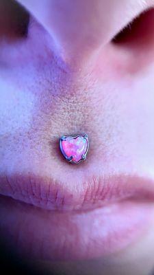 Threadless titanium set with a heart shaped opal