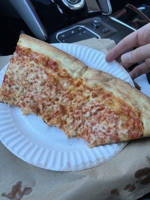 Forgot to take a pic before I dove in, but you can still see how big it is compared to the plate! Delicious NY style slice!