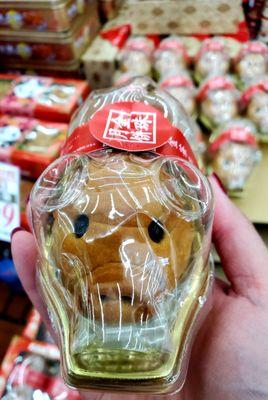 $3.49 Golden Pig Moon Cake, sooo cute!!! The filling inside is red bean paste. They're also selling boxes of 3pk Piggies for $9.99.