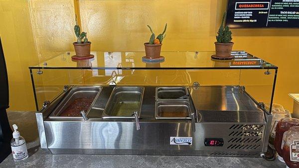 Salsa Bar...  Mild Mild Spicy Don't forget to ask for the carrots and jalapeños!!