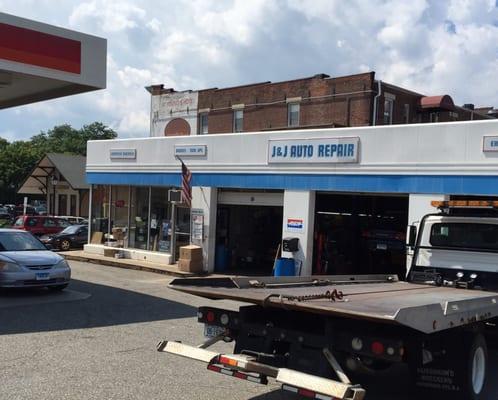 This is the main garage and used car lot. They have a body shop a block away.