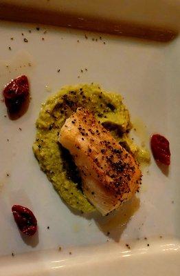 Seabass over Fava bean puree with sundried tomatoes.  Cooked to perfection.