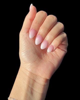 Beautiful pink to white ombré dip powder manicure