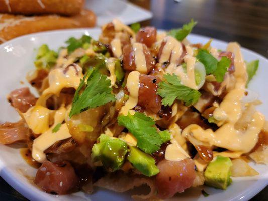 Poke nachos overly sauced.