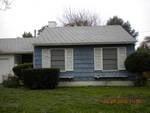 Reseda home Before - failing roof, old wood windows, old wood siding, high maintenance landscaping, poor efficiency home.