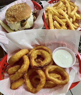 Bacon cheeseburger, onion rings and crinkle fries