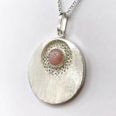 Sterling silver and pink quartz necklace handmade by awarded Peruvian artist Carlos Yauri.