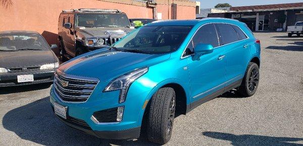 Cadillac CT5 full wrap to Teal blue