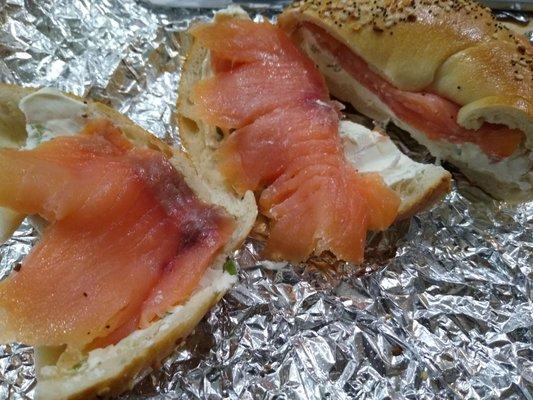 Scooped out everything bagel with scallion cream cheese and lox