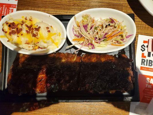 Although the ribs look burnt they were very good,  loaded mash potatoes good, broccoli slaw