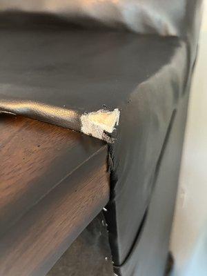 The torn leather on the couch.