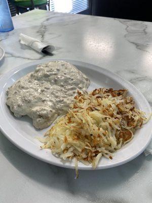 Sausage gravy biscuit w/ a side of hash brown